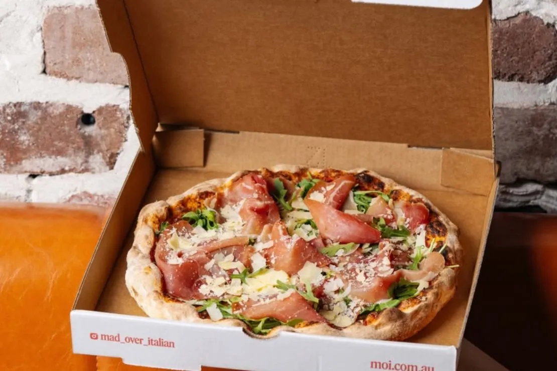 Woodfired pizza in a MOI takeaway box